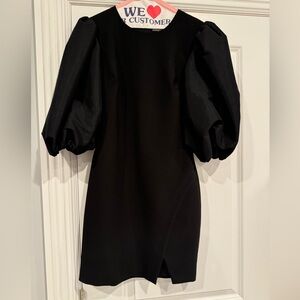 Likely puff sleeve dress. Worn once and dry cleaned. Excellent condition.